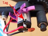 The tag holding the motor in its case