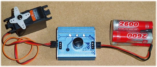 RC servo tester connects between battery pack and servo